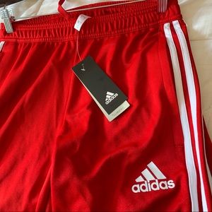 Red Adidas joggers
